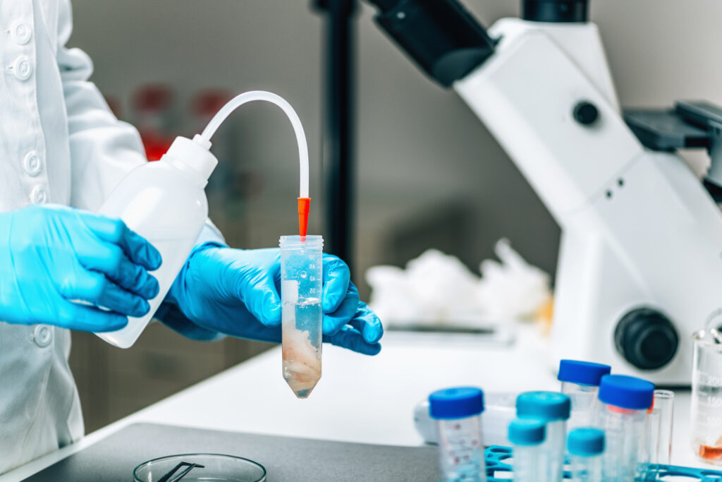 Scientist testing sea fish samples for water quality and potential toxins affecting childhood health.