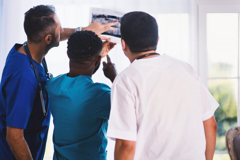 a group of people standing in a room