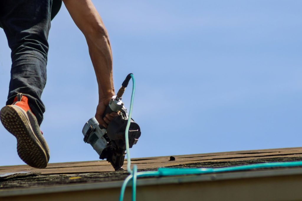 a person holding a skateboard