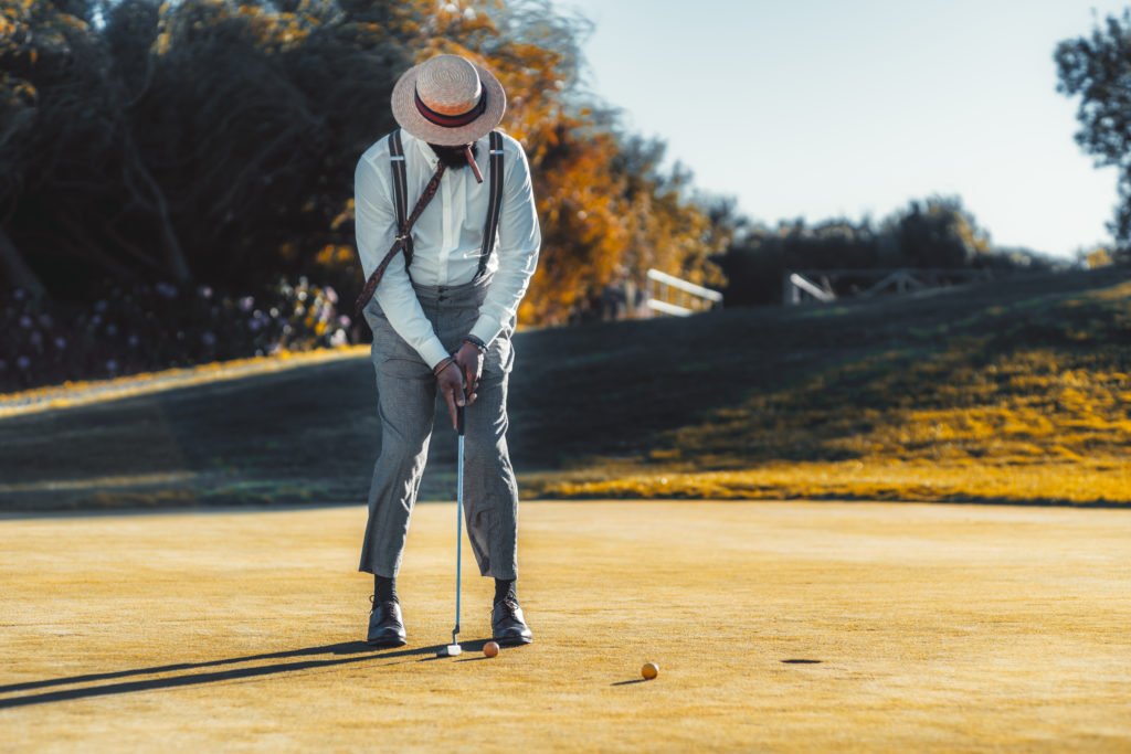 Man playing golf