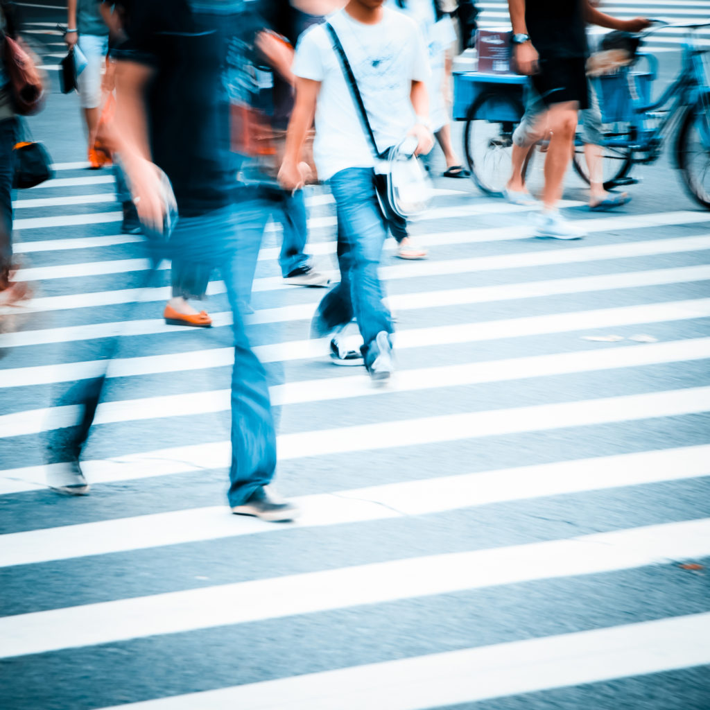 people walking on big city street