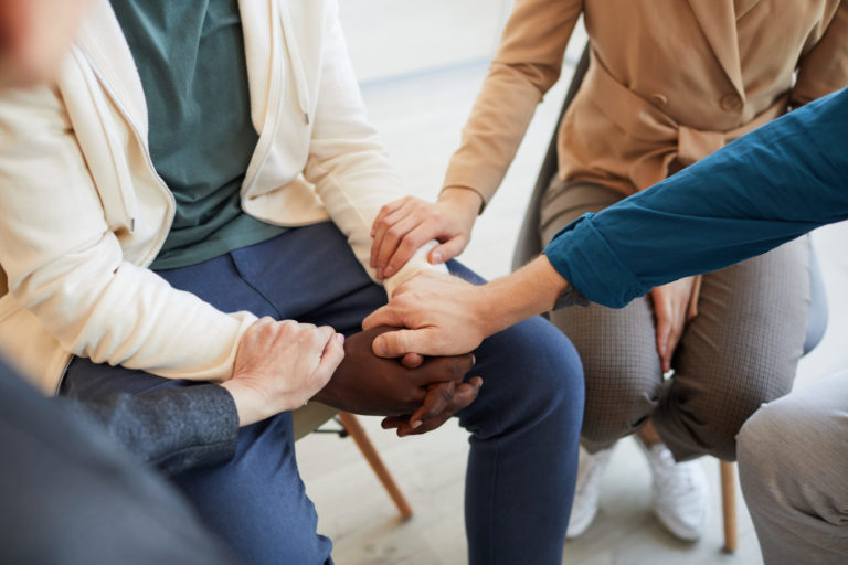 a group of people seated in a circle