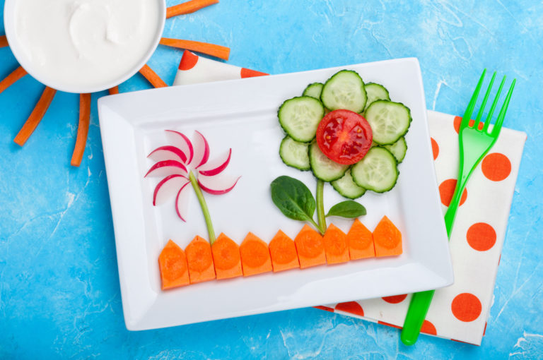 Kids food. Funny vegetable salad for kids. Healthy food with vegetables